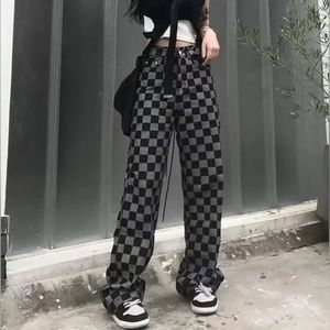 Black and grey checkard jeans size m.